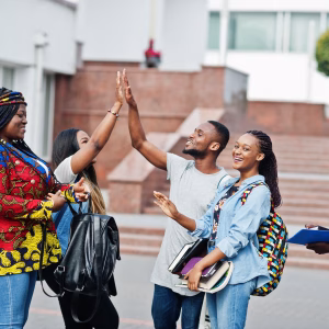 group-five-african-college-students-spending-time-together-campus-university-yard-black-afro-friends-studying-gives-high-five-each-other